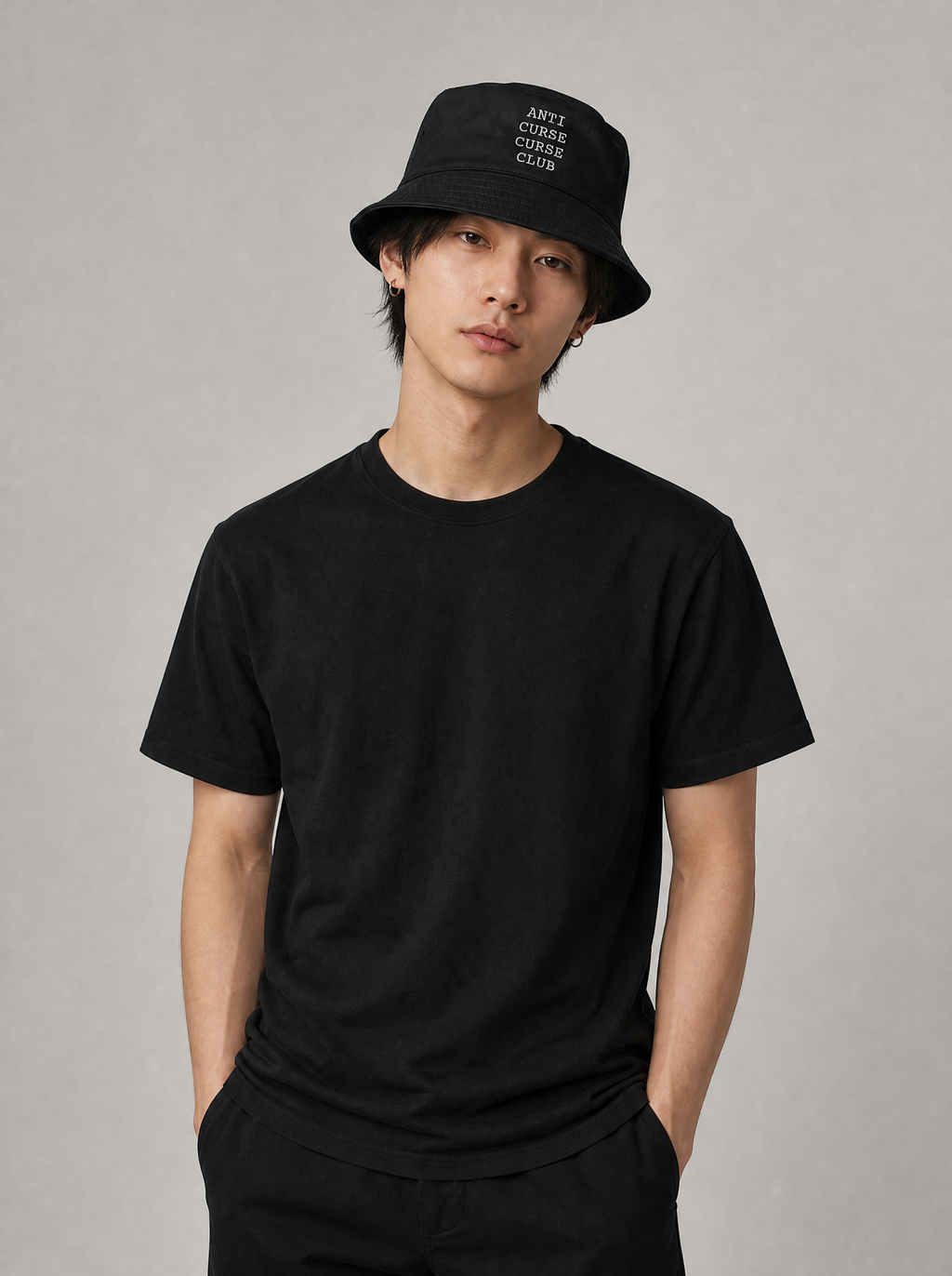Anti Curse Curse Club Embroidered Bucket Hat worn by model