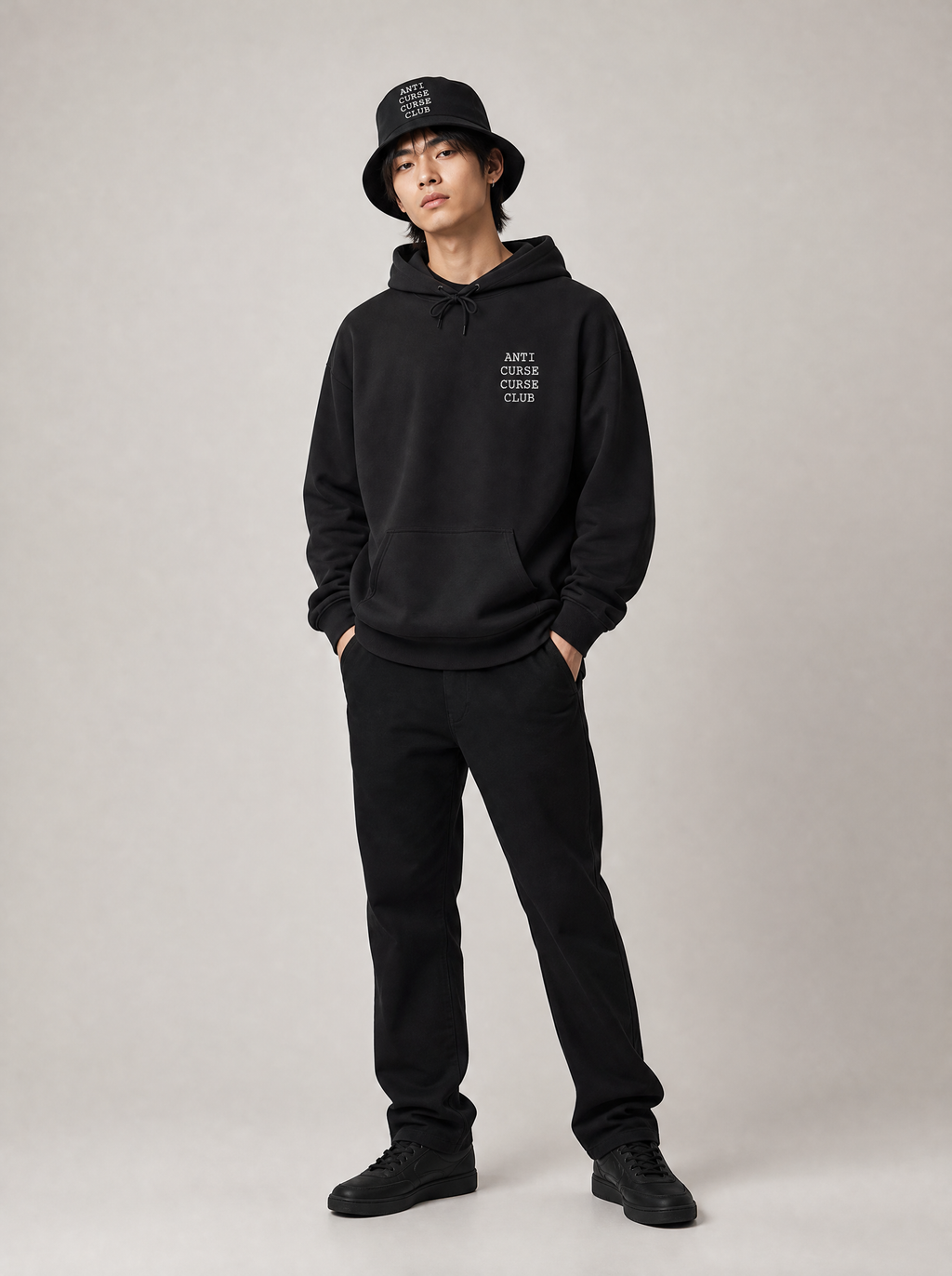 Worn by a Japanese male model: Curse Breaker Set: Chest Logo Hoodie + Bucket Hat