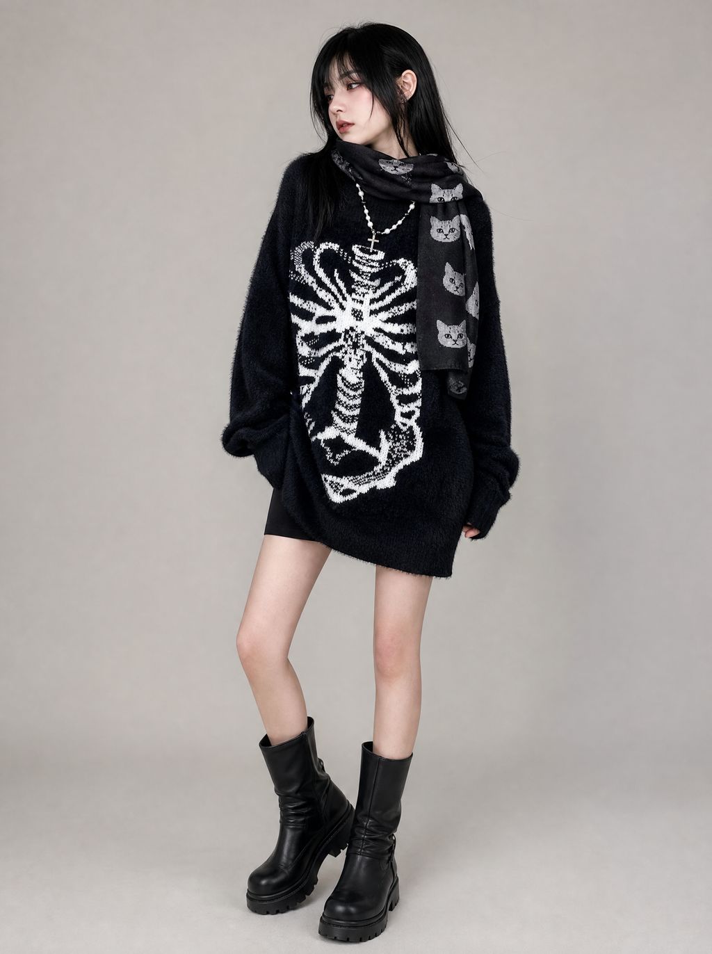 Worn by a Japanese female model: Goth Knit Set: Skull Knit Sweater + Cat Print Scarf