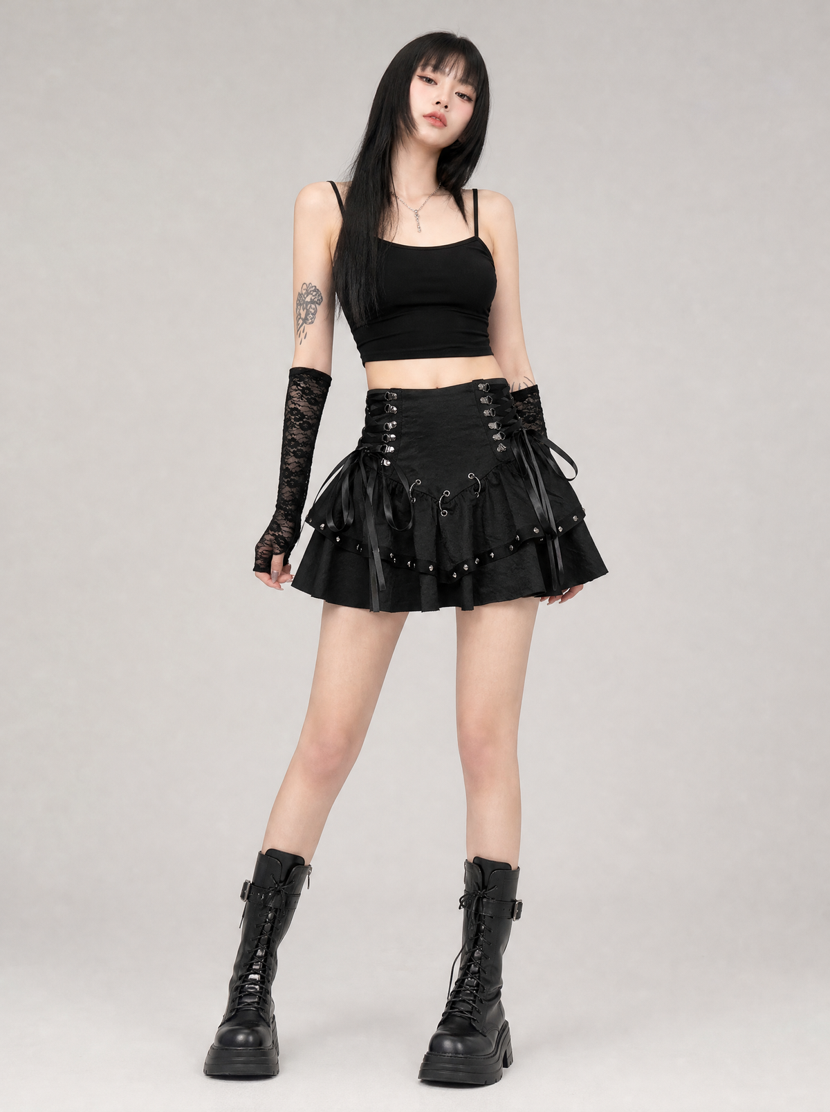 Worn by a Japanese female model: Rivet Bandage Mini Skirt