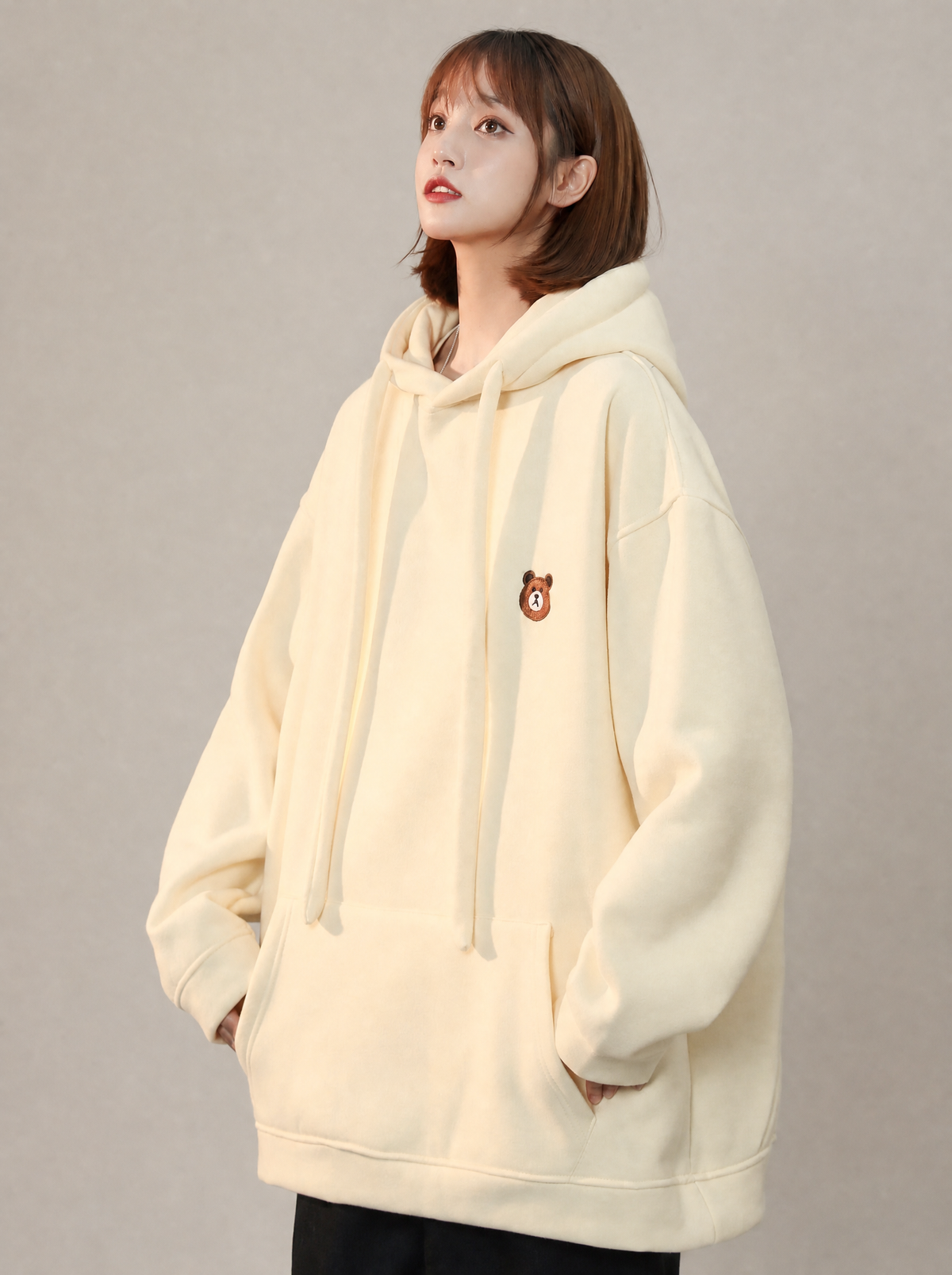 Worn by a Japanese female model: Women's Classic Teddy Hoodie