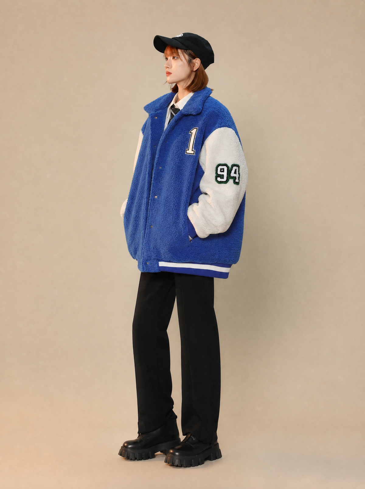 Worn by a Japanese female model: Women's Year 94 Furry Varsity Jacket