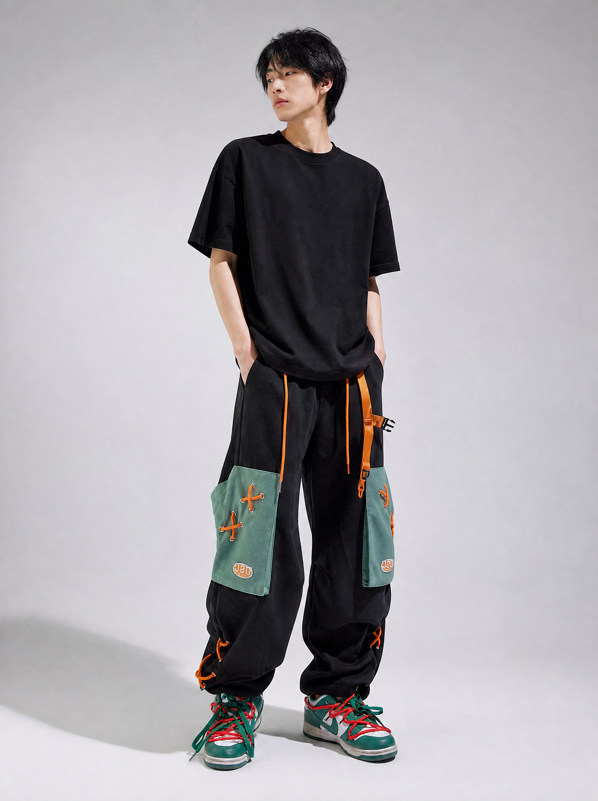 Worn by a Japanese male model: UUC-P5 Laced Pants